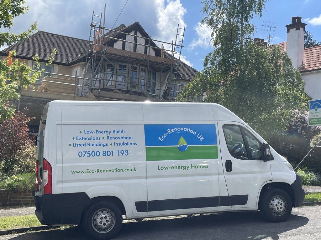 The van on site, scaffold up and the gable opened out