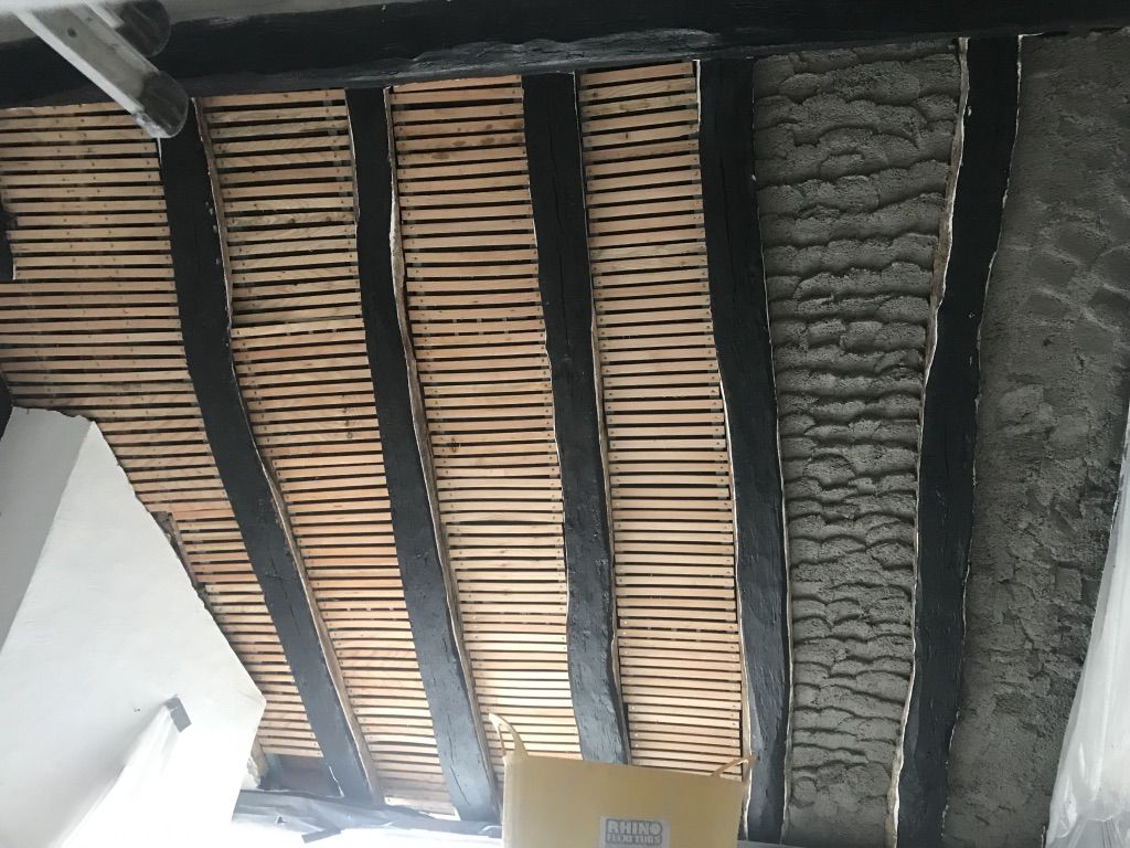 Diathonite applied between the rafters, laths relaid