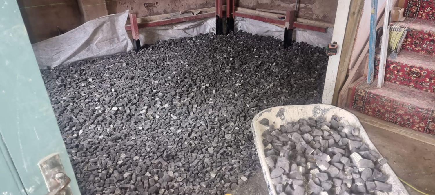 Pouring & raking in geocell foam glass aggregate