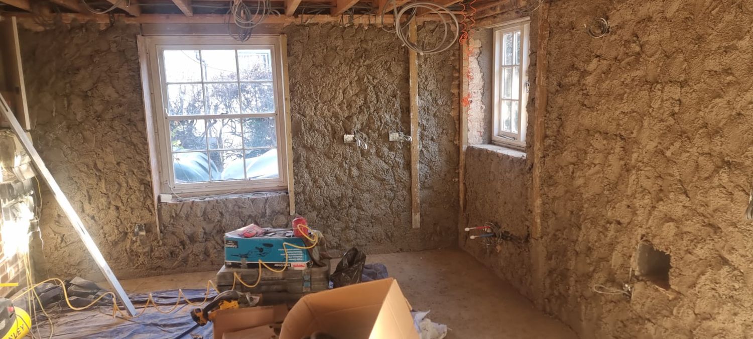 Diasen Diathonite Evolution lime-cork-clay based insulating plaster applied to walls