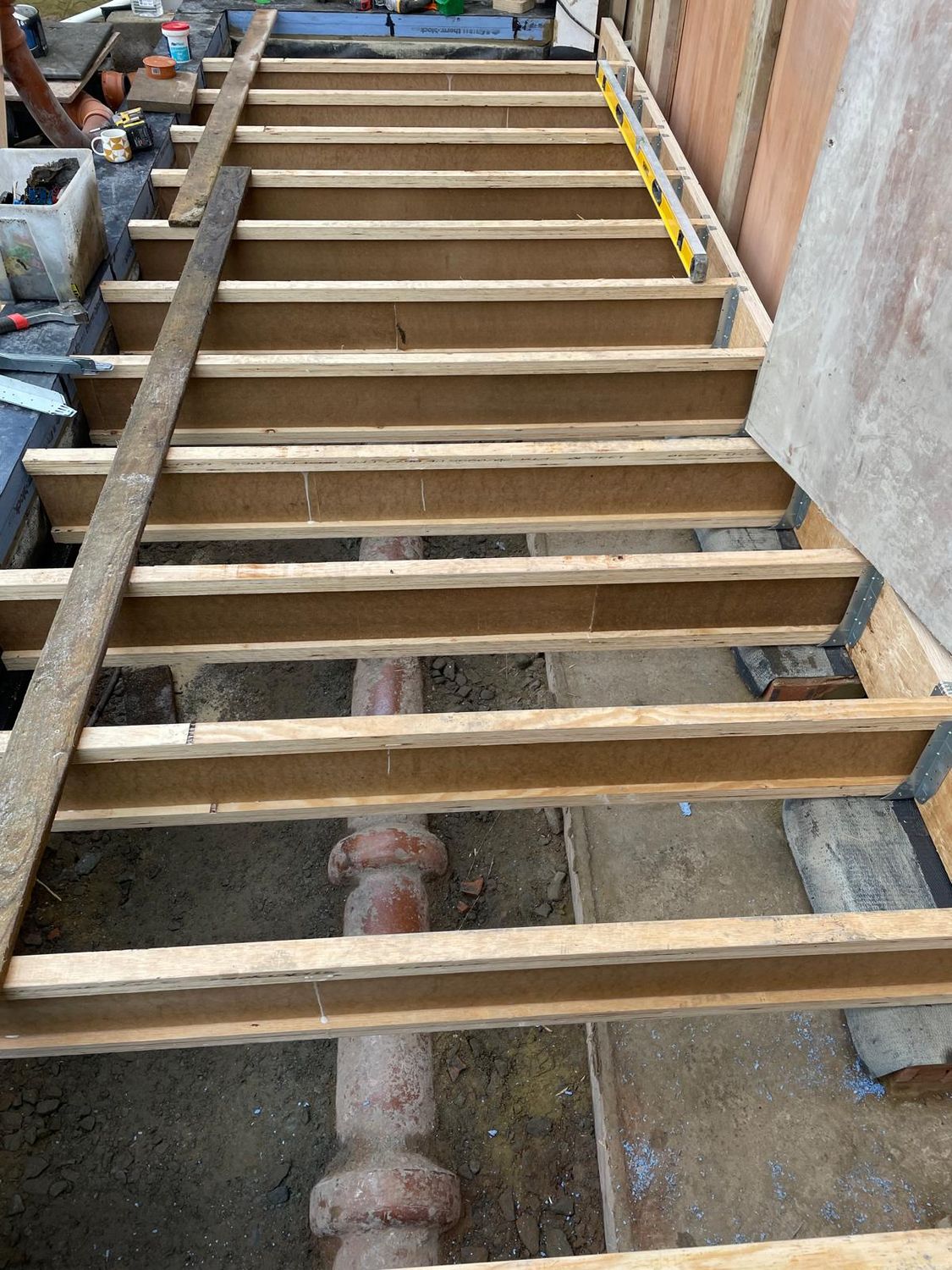 Building floor structure with I-joists for extension in Finchley