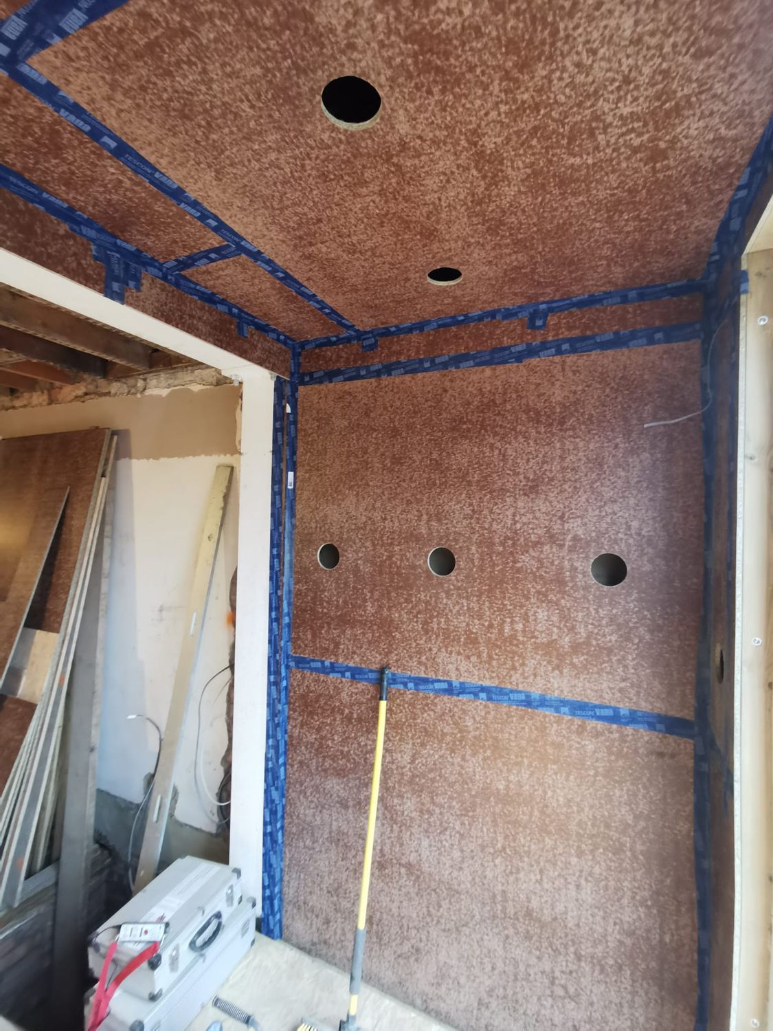 Preparation for blowing cellulose insulation to roof floor and walls