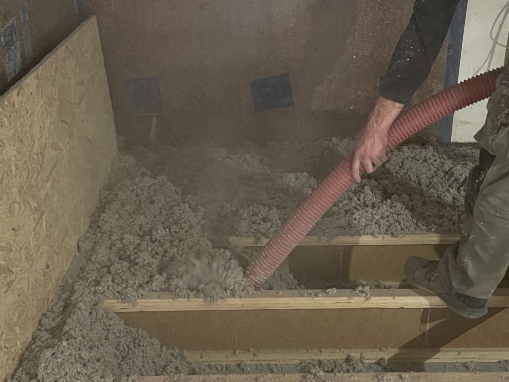 Warmcel cellulose insulation to floor