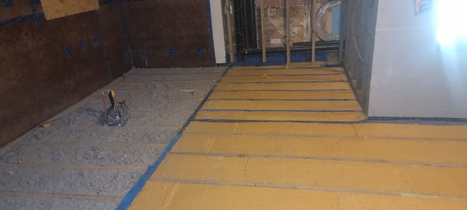 Floor insulation completed: new extension floor with blown-in cellulose and existing floor with wood fibre
