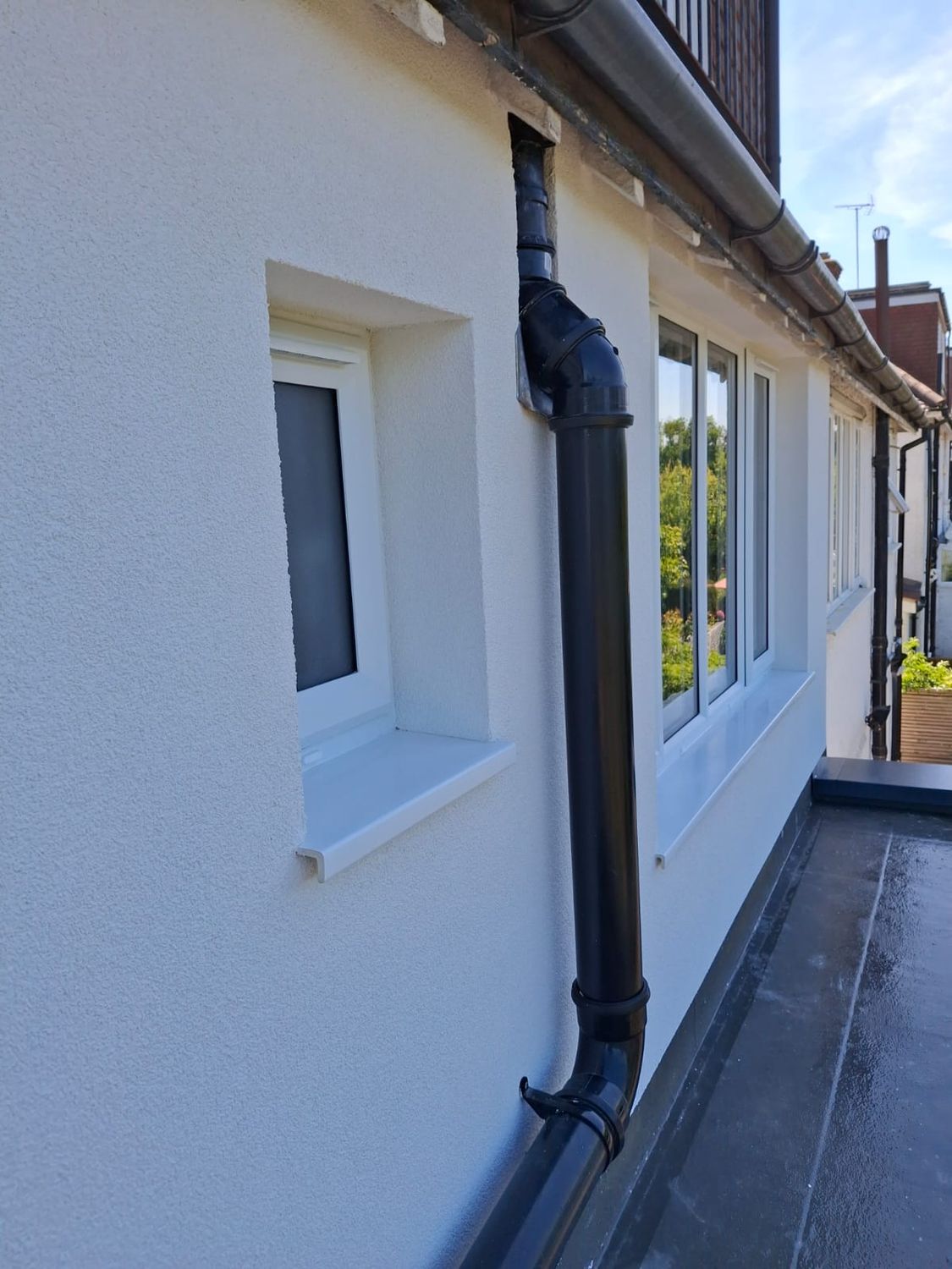 External wall insulation with UPVC window sills