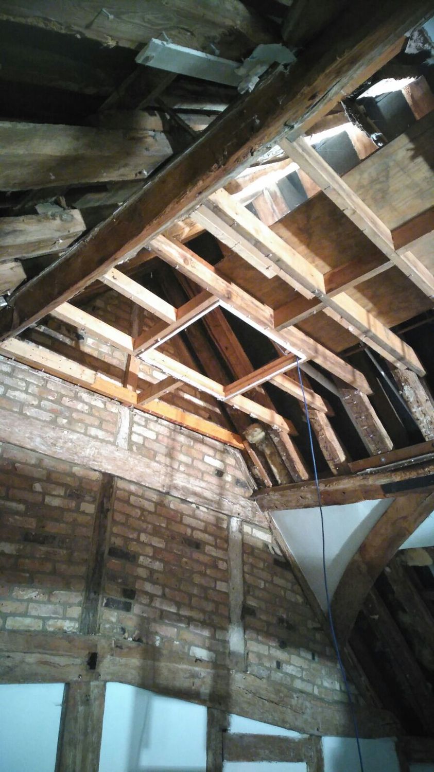 Oak framed roof in listed building : ceiling structure before works begin