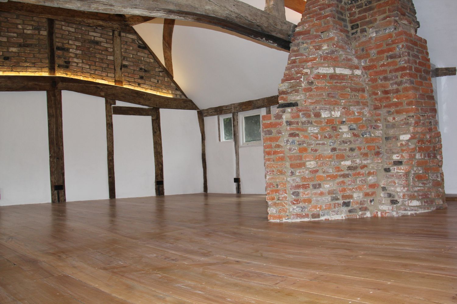 Fully insulated and refurbished living room with exposed oak structure