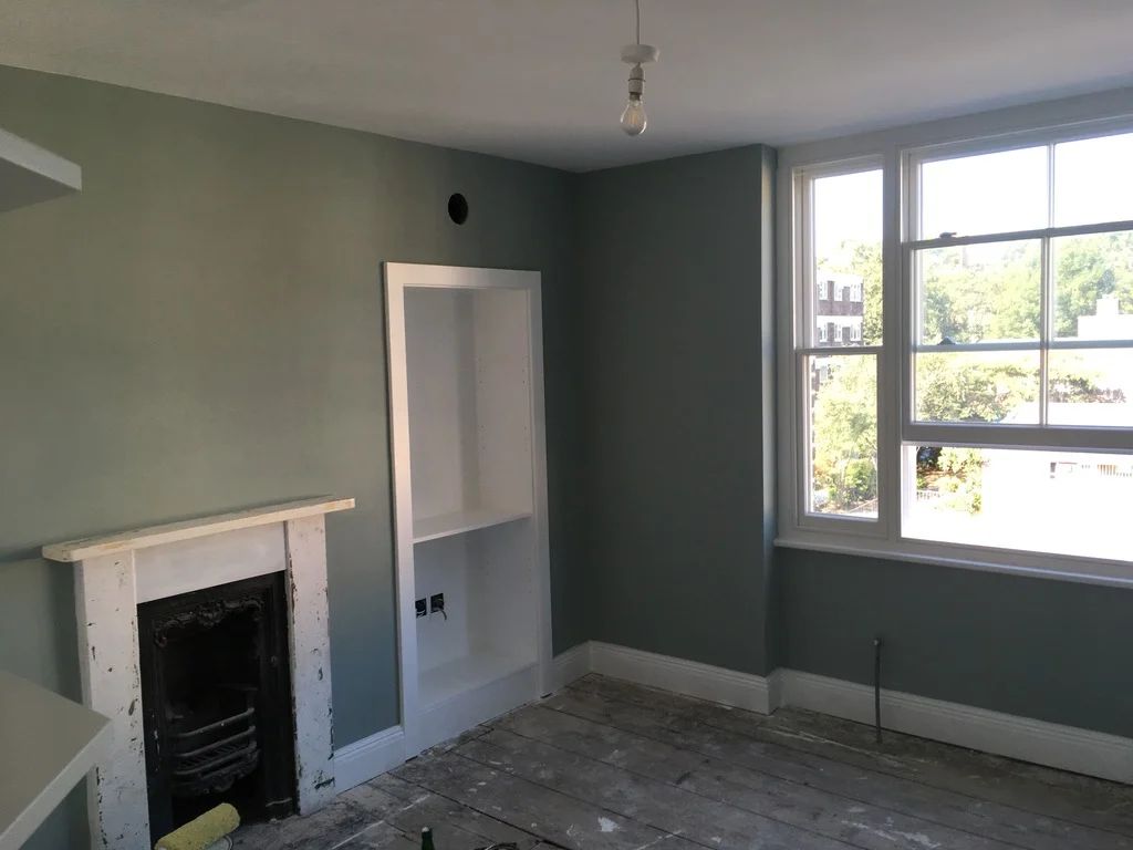 Internal wall insulation completed, walls are lime plastered and decorated in Islington