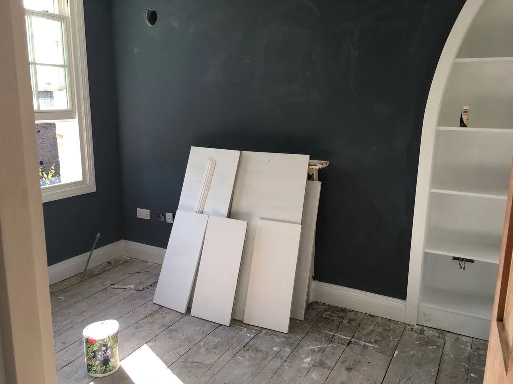 Internal wall insulation completed, walls are lime plastered and decorated in Georgian townhouse in Islington