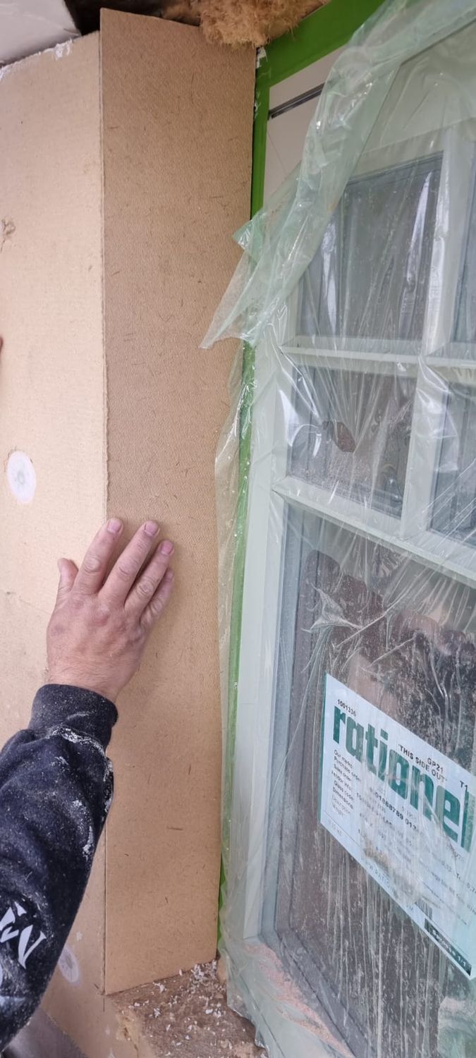 External wall insulation detail - 20mm wood fibre insulation board is installed to window reveal to remove thermal bridge at window