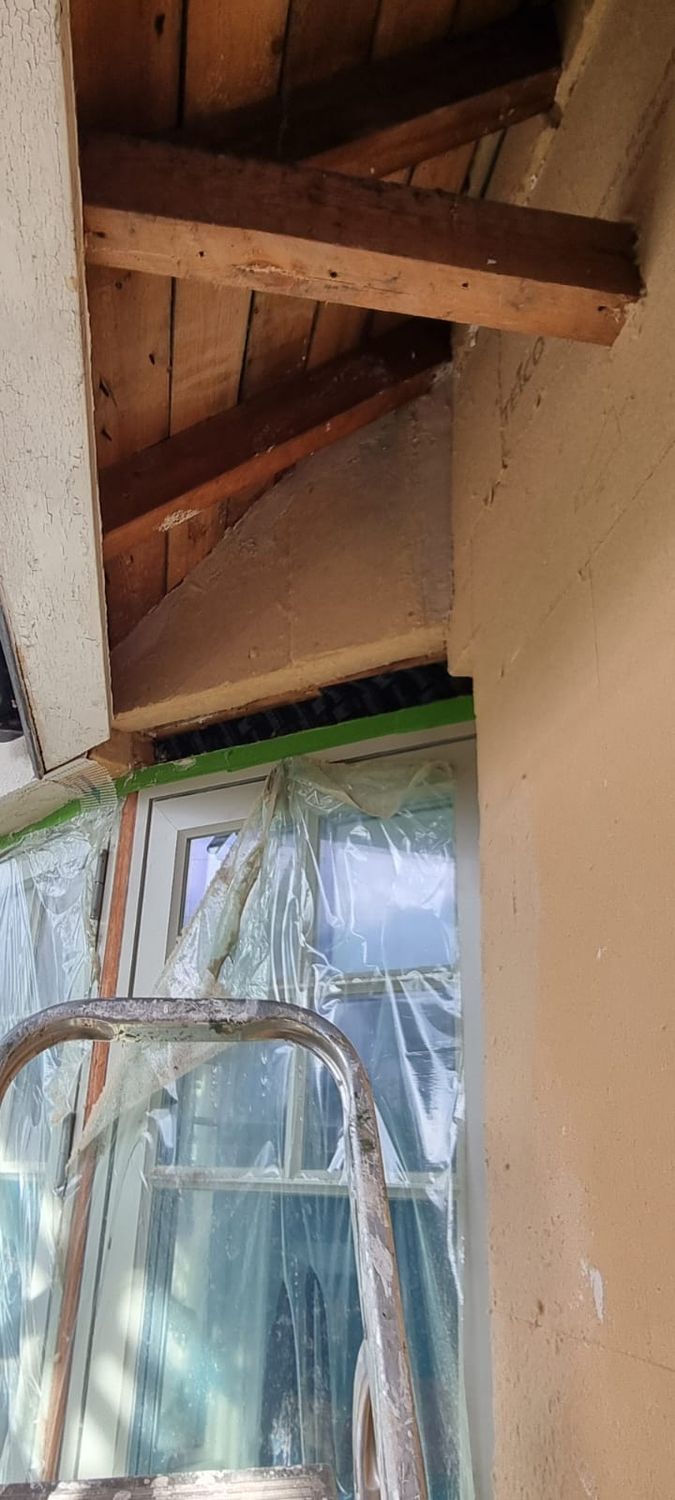 External wall insulation detailing under eaves
