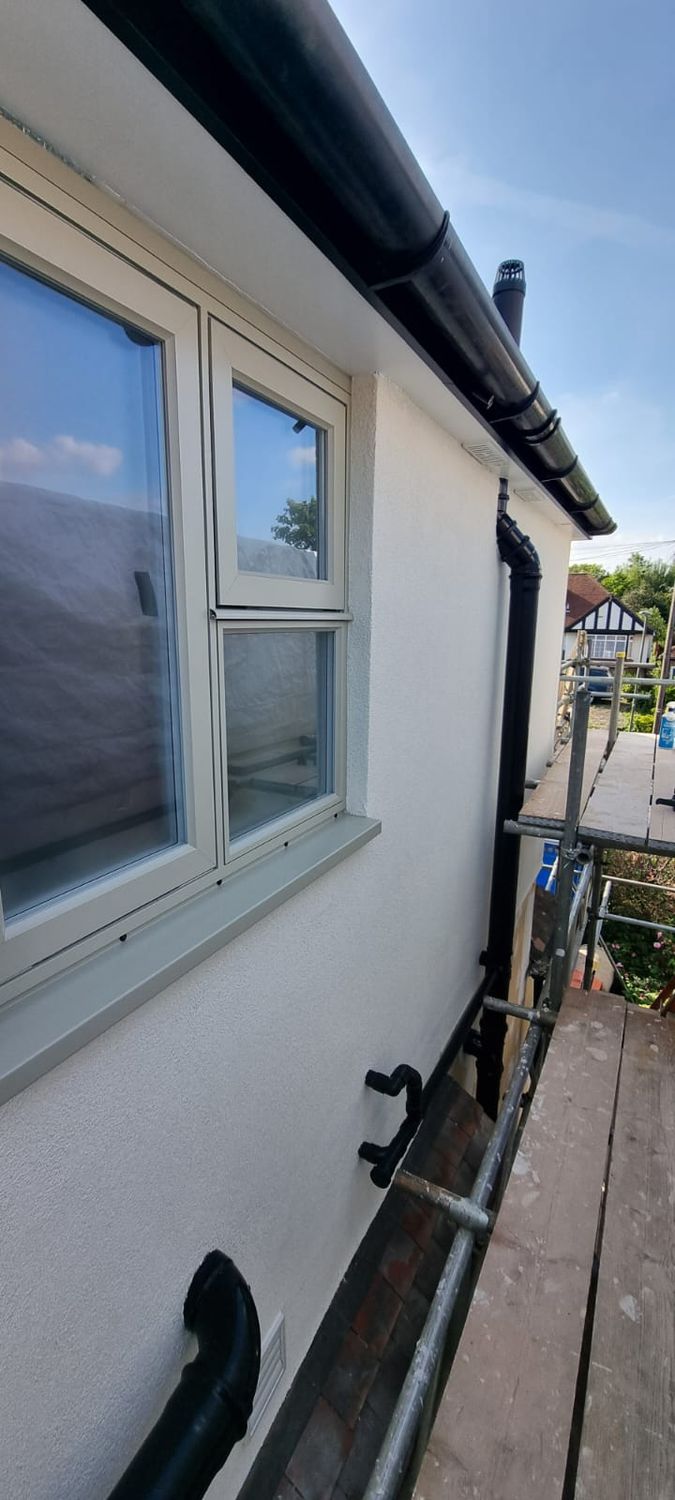 External wall insulation completed, window reveal, soffit and waste pipes adjusted