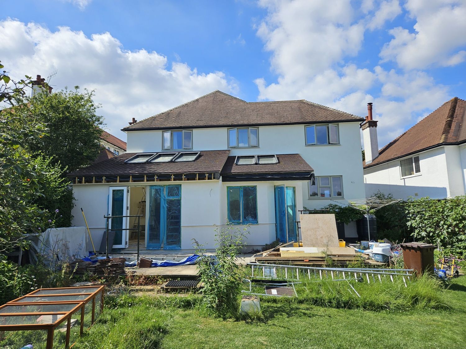 External wall insulation with wood fibre boards and breathable silicone render finish - completed on rear elevation