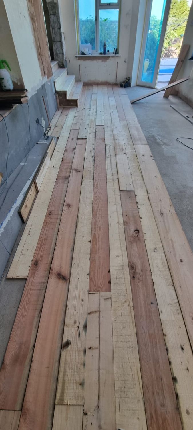 Reclaimed redwood floor installation