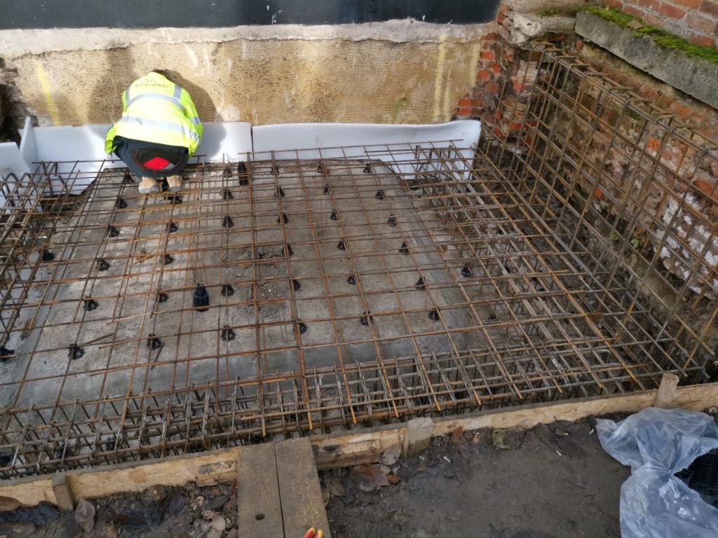 Reinforced raft for listed building extension in St Albans