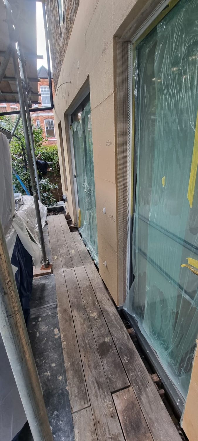 Installation of Steico wood fibre boards onto all external walls