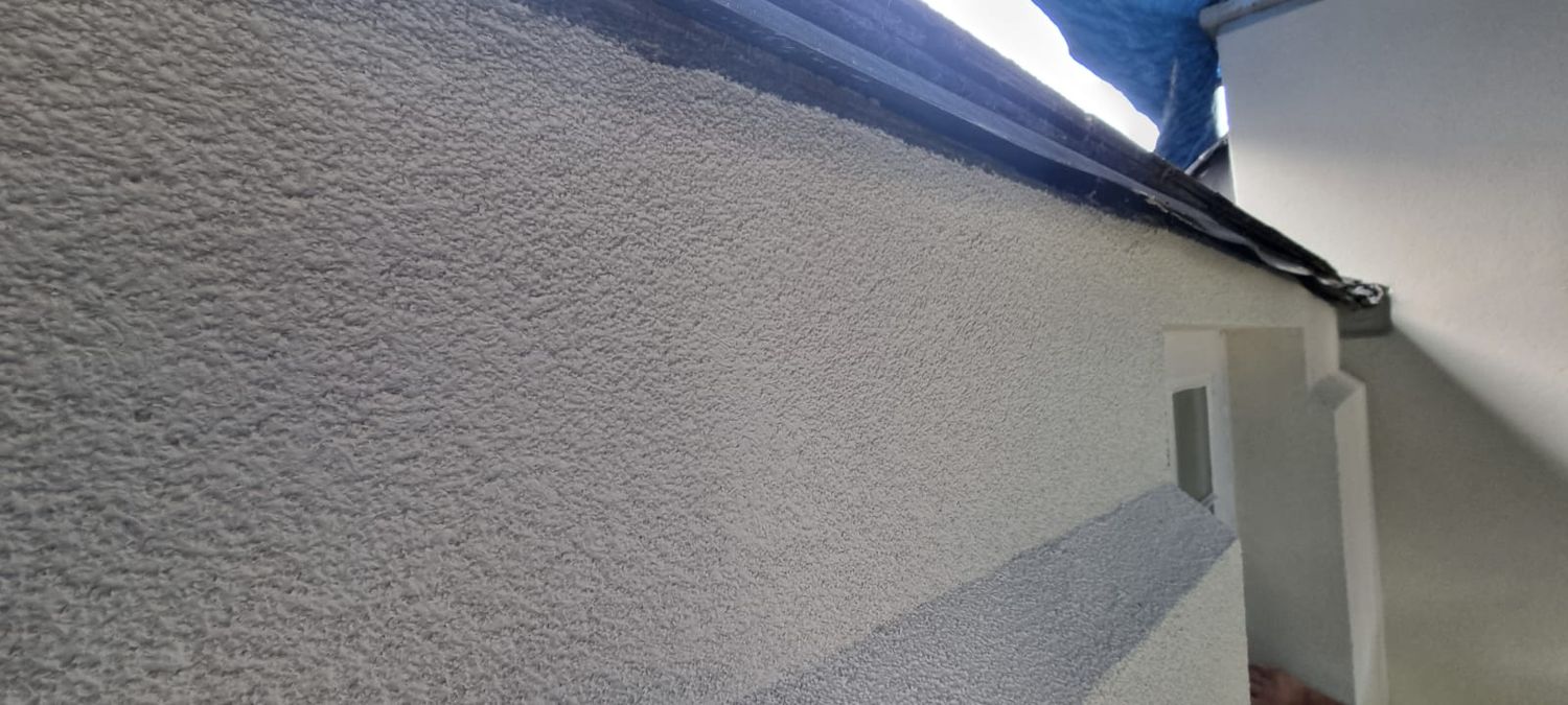 Antique white, breathable silicone render finish