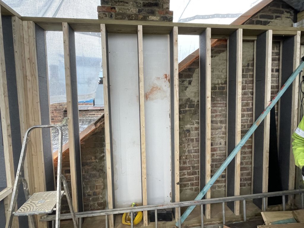 Loft conversion, using insulated I-joist frame system for building new walls