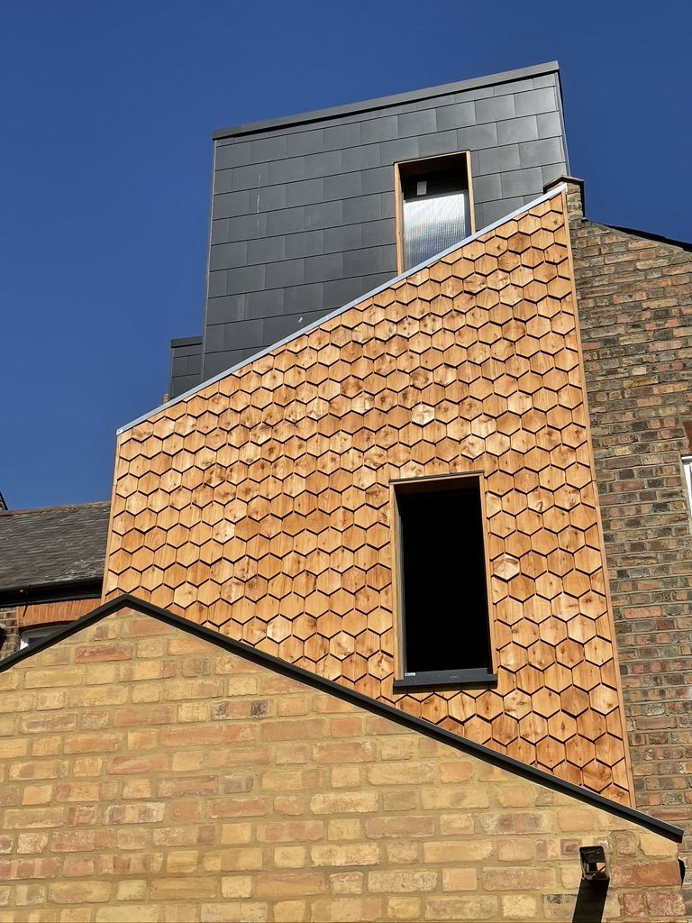 Completed cedar wood shingle cladding