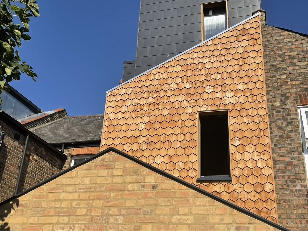 Completed cedar wood cladding