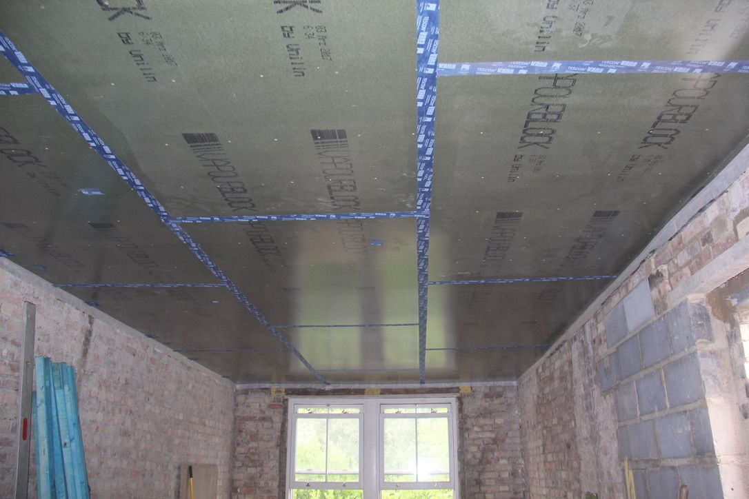 Finsa Airtight vapour barrier racking boards taped with ProClima airtightness tape in Muswell Hill, LOndon