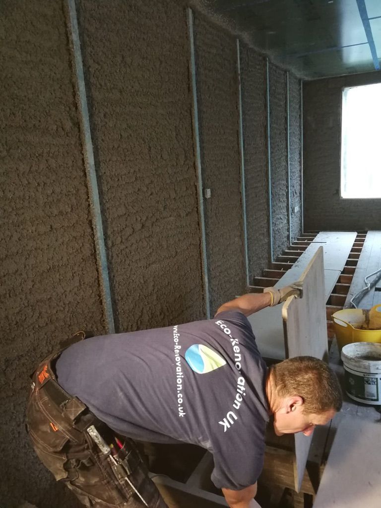 Diathonite Evolution lime cork insulation plaster sprayed in layers to reach required thickness in Muswell Hill, London