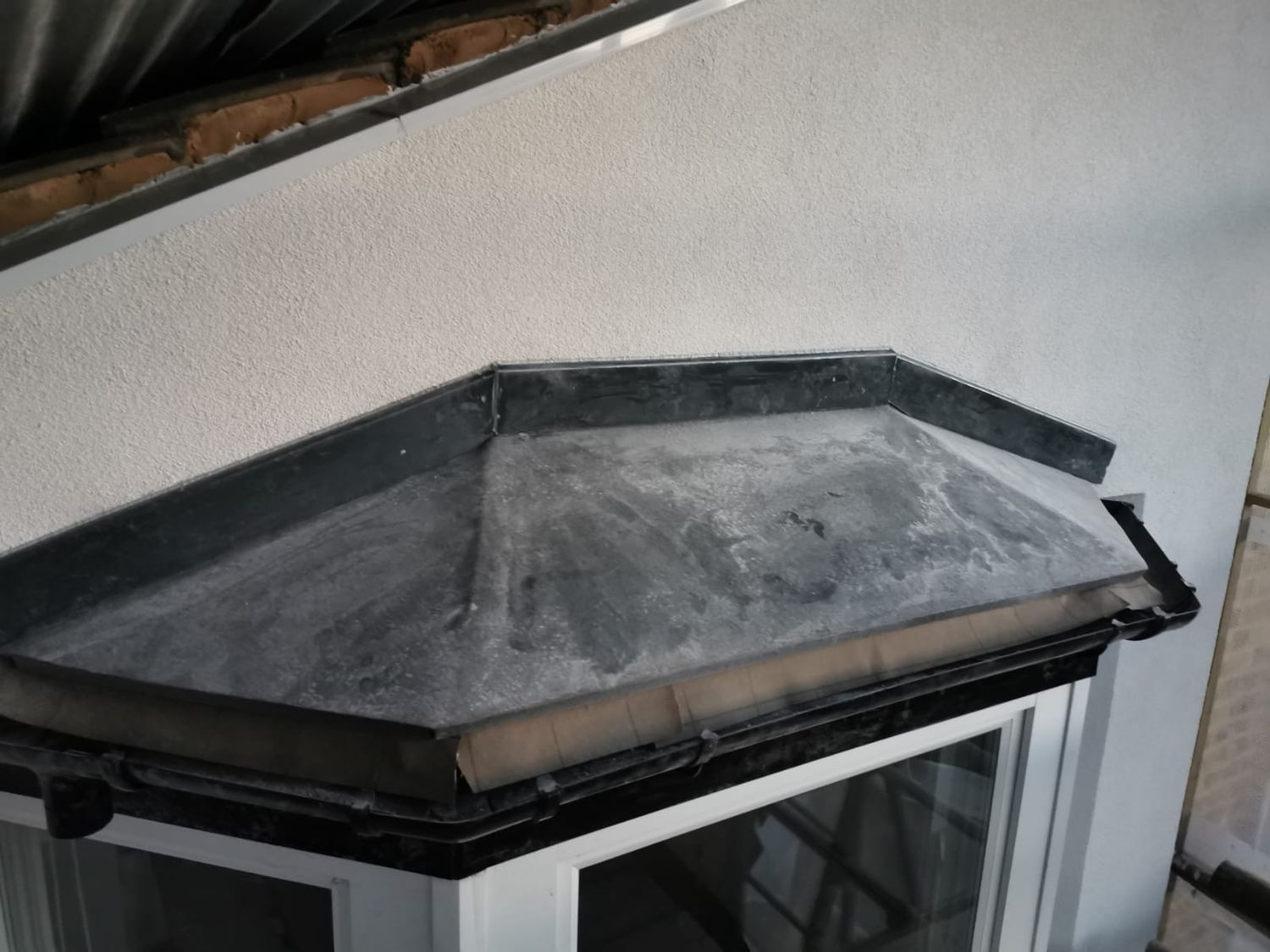 New, insulated bay-window roof completed