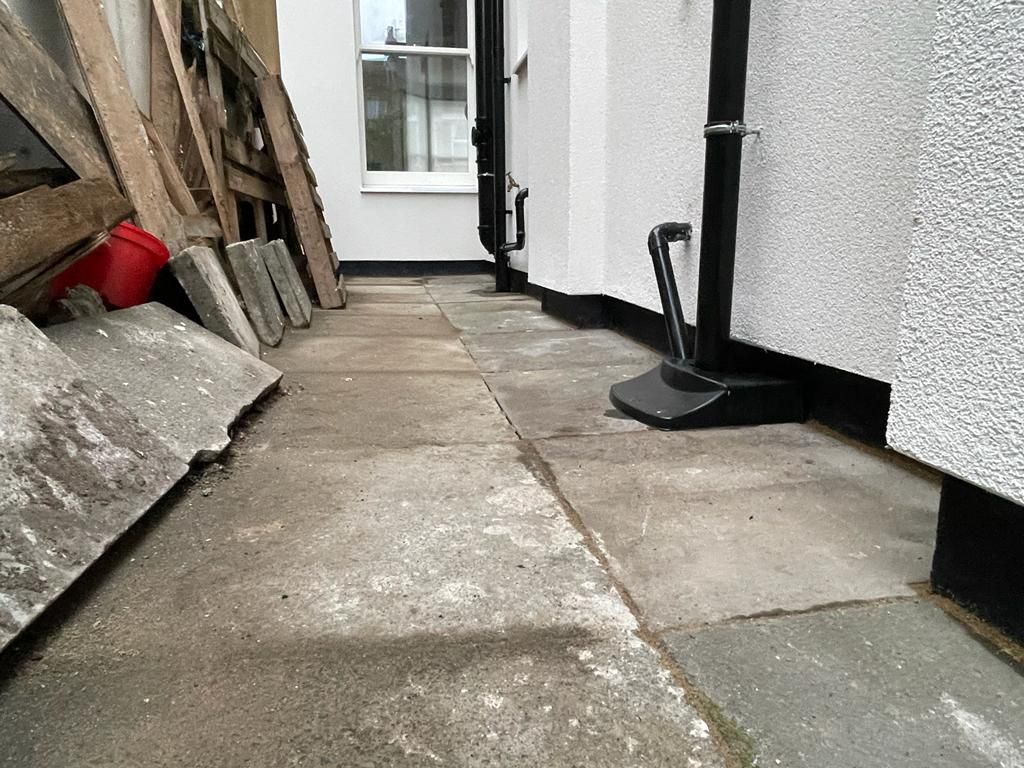 External wall insulation with plinth insulation - black mosaic render
