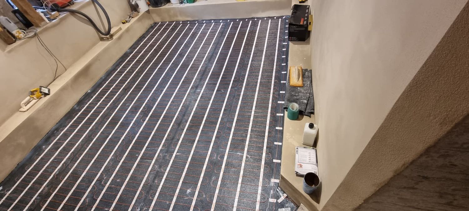 Installation of electric underfloor heating in basement