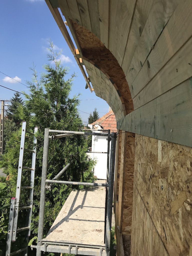 Hempcrete wall with curved feature - curved shutter in place