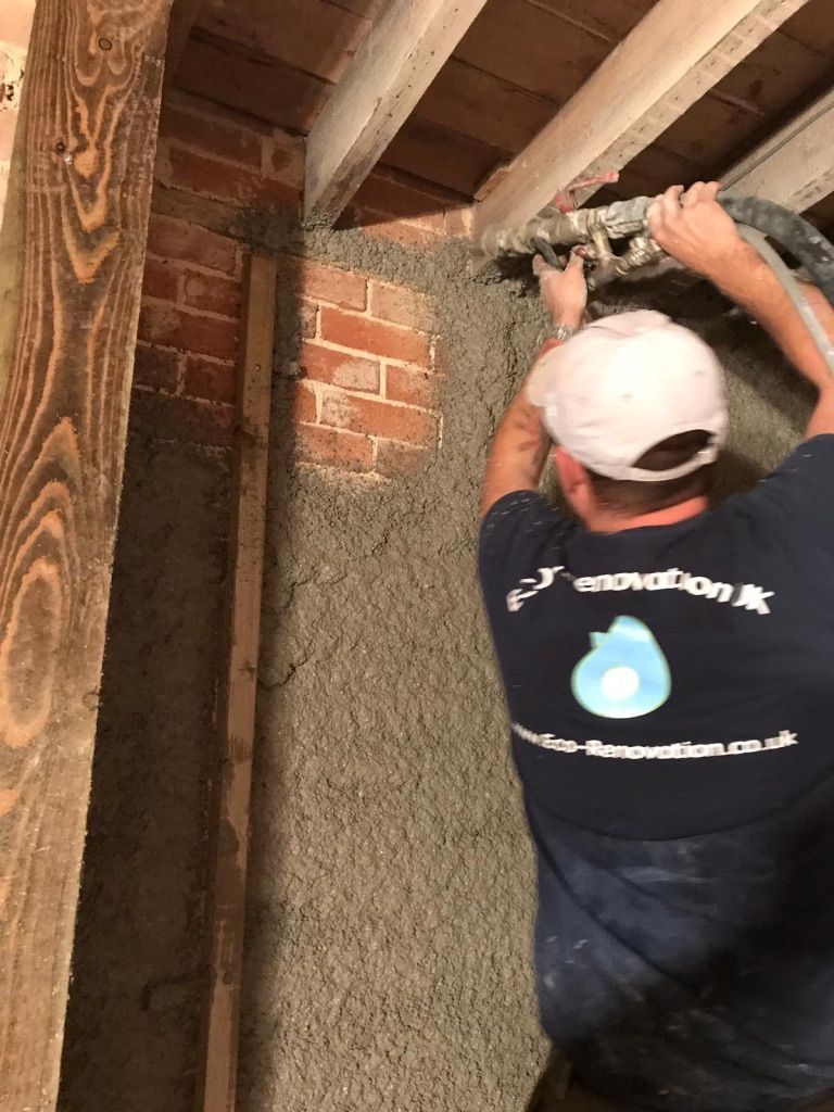 Diathonite Evolution lime-cork-clay insulating plaster being sprayed to walls