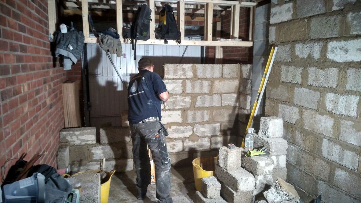 Hempcrete block wall being built
