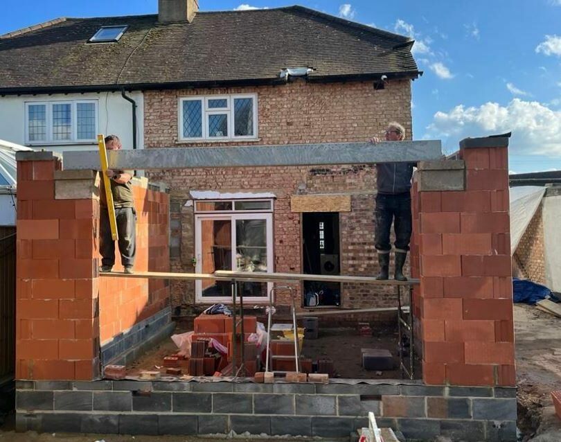 New ceramic block walls completed, insulated lintel being installed
