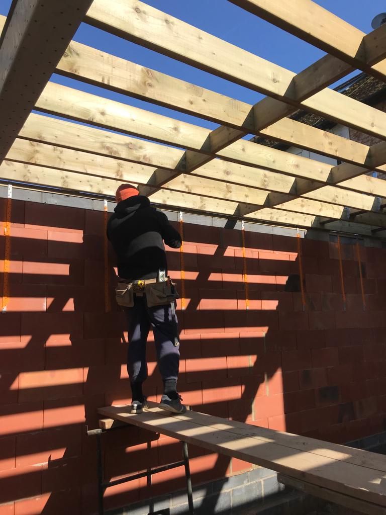 Flat roof structure being constructed