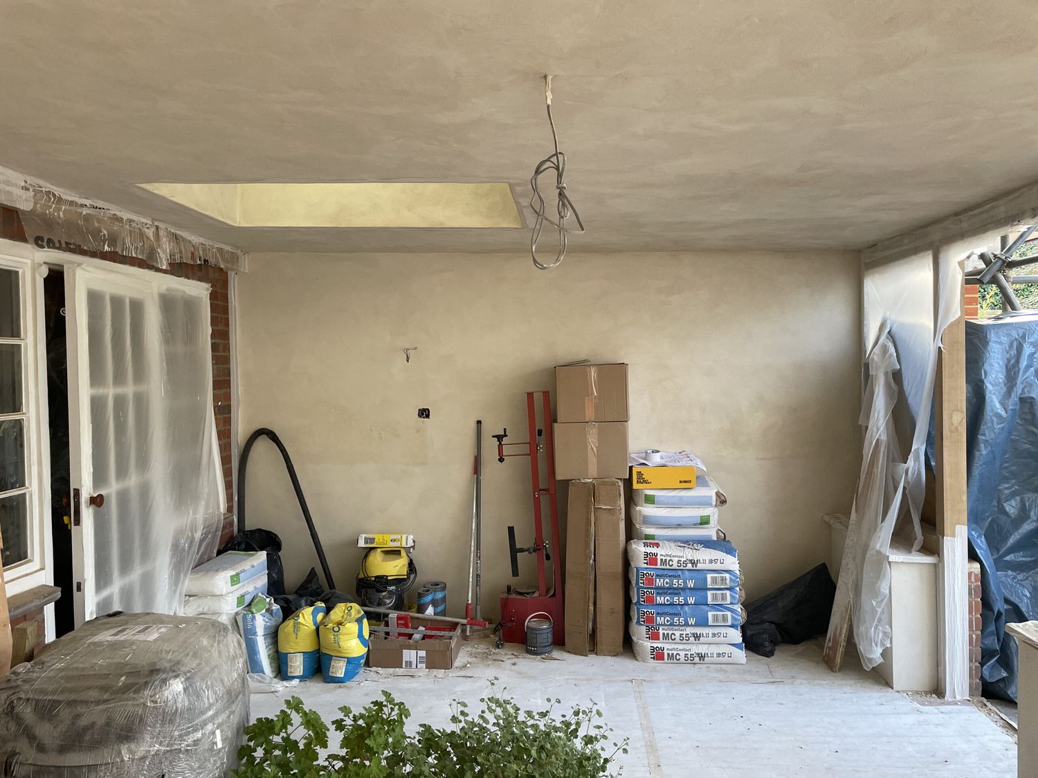 Baumit breathable lime based plaster applied onto wood fibre insulation board