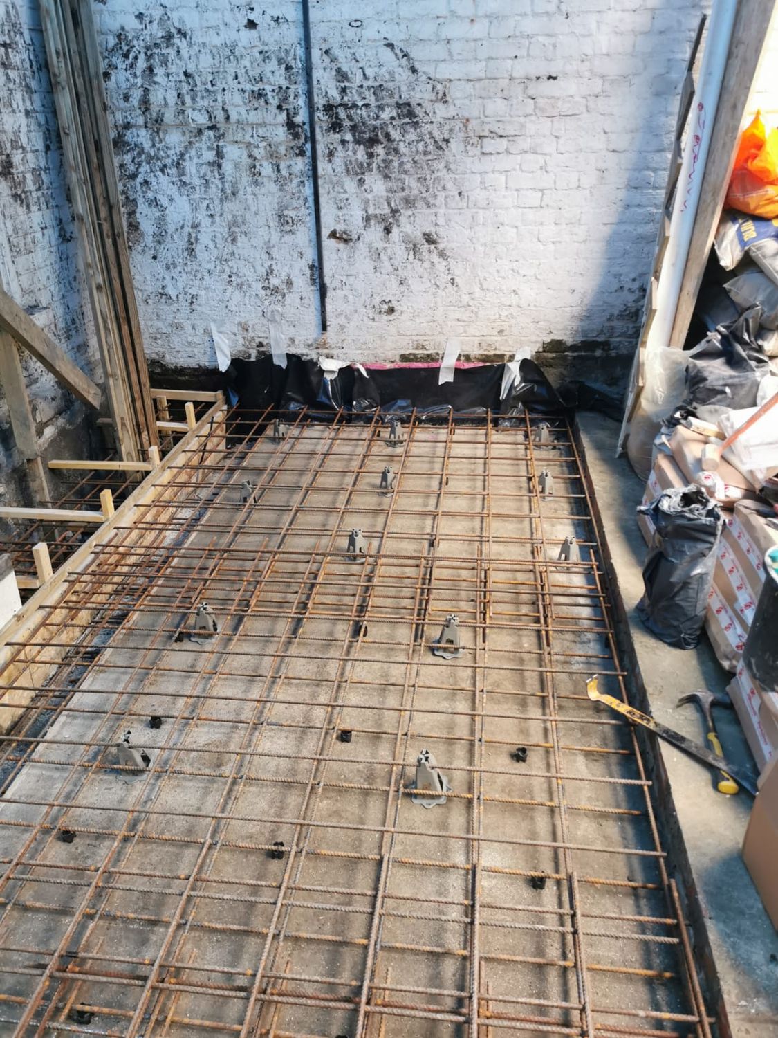 New floor slab for extension in Archway