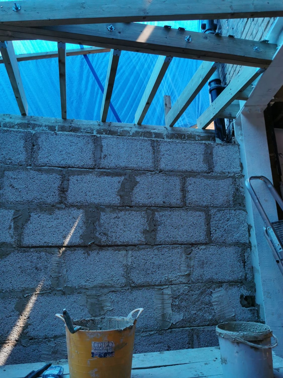 Extension wall is being built with hempcrete blocks