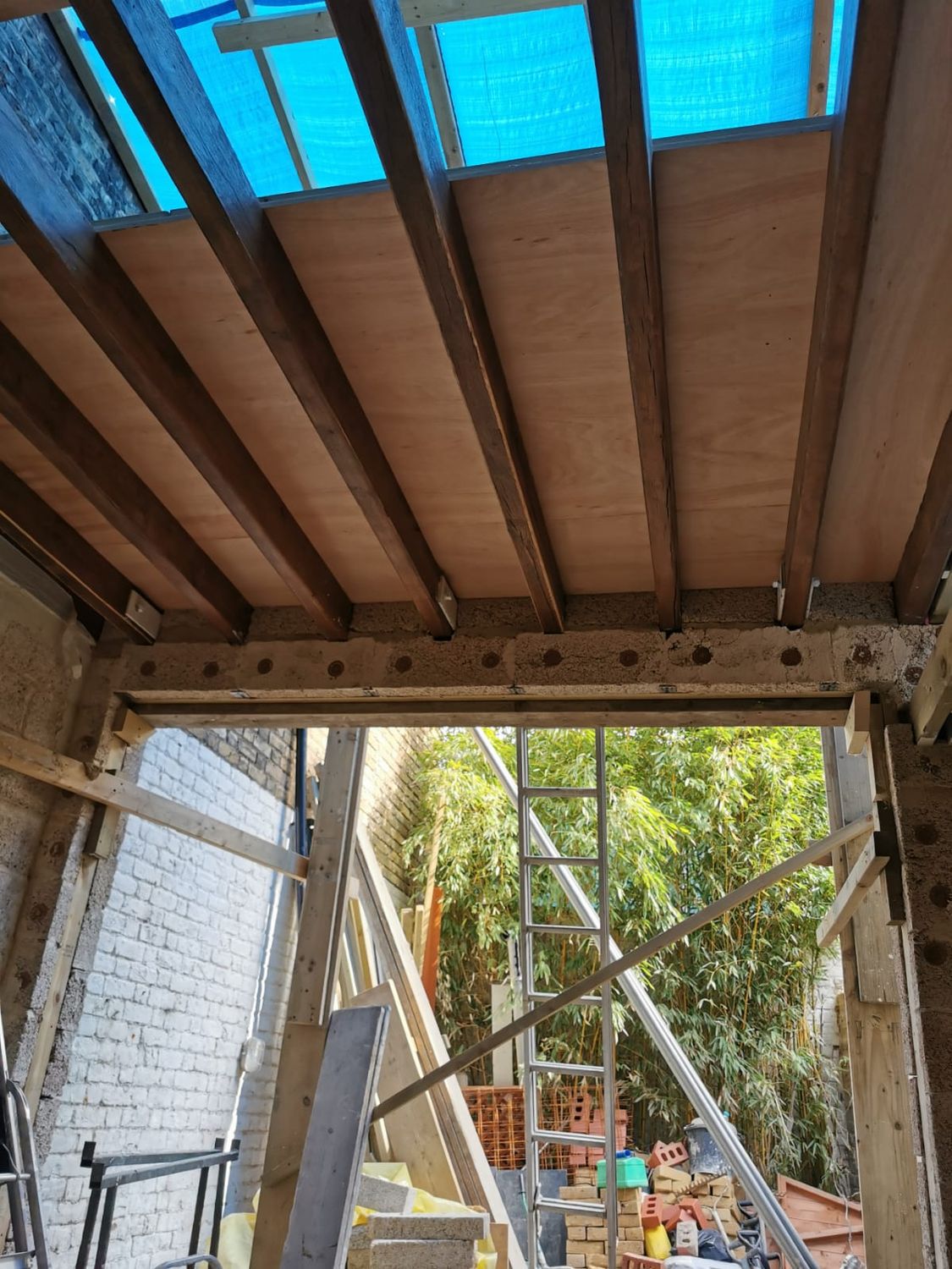 Extension roof and rear wall with large opening and hempcrete wall