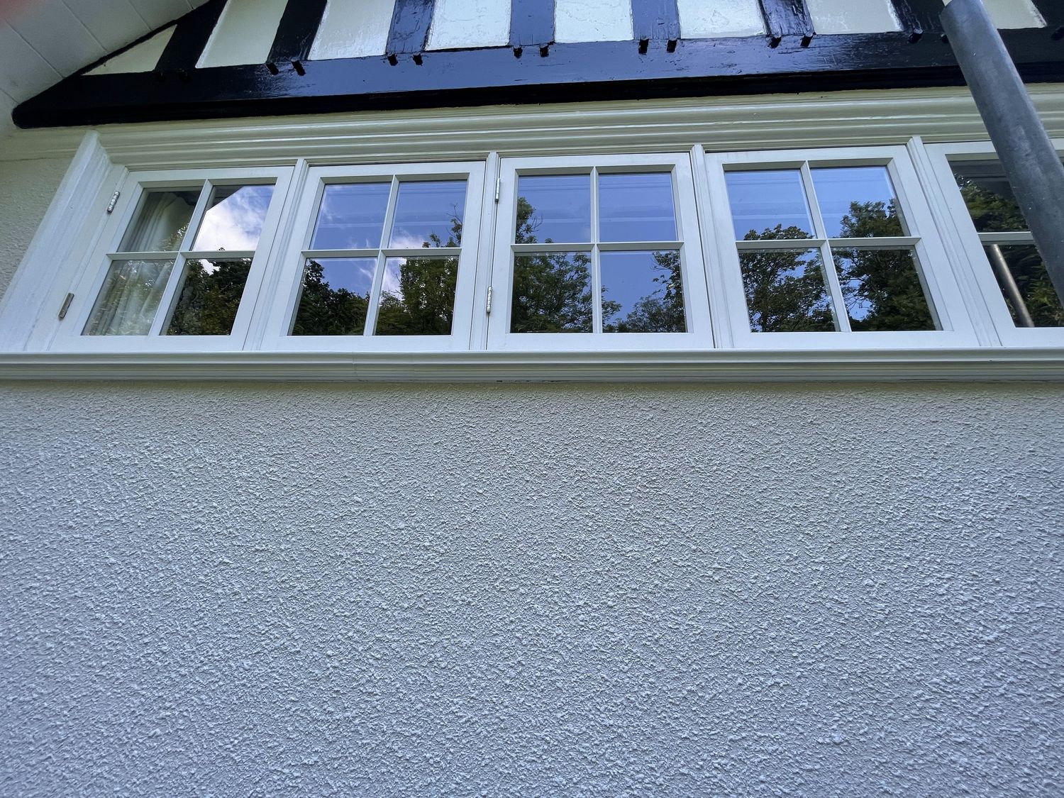 Diasen Argatherm Lime roughcast render dash finish on listed building in Harrow. London